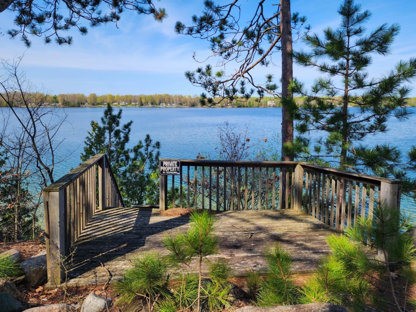 PANORAMIC VIEWS OF LONG LAKE. Follow the paved private road into - Beach Lot for sale in Cheboygan, Michigan on Beachhouse.com