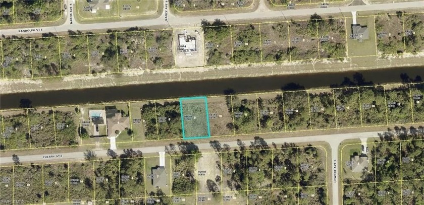 CANAL LOT, QUIET STREET, PLENTY OF NEW CONSTRUCTION ALL AROUND - Beach Lot for sale in Lehigh Acres, Florida on Beachhouse.com