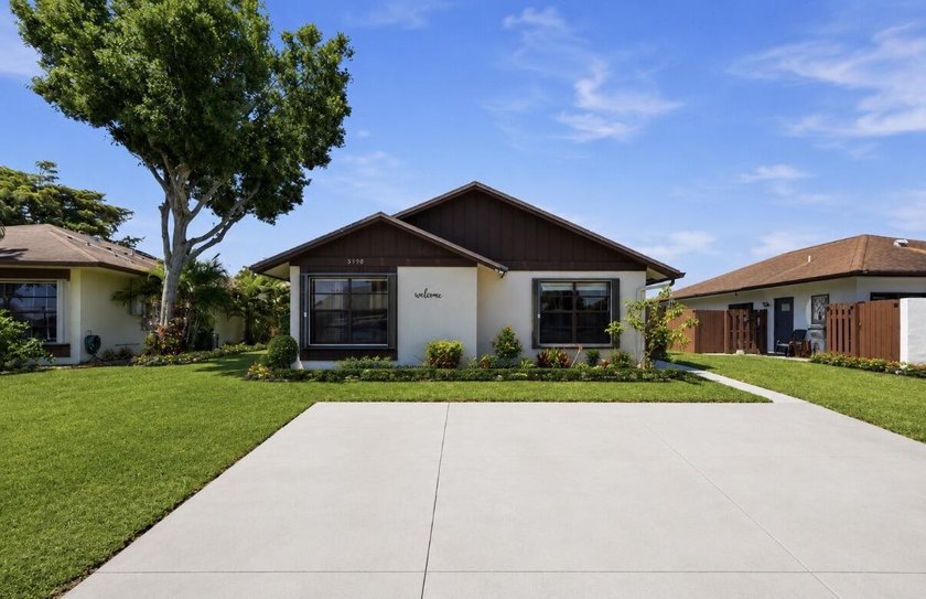 Welcome to this spacious and well-maintained home located in the - Beach Home for sale in West Palm Beach, Florida on Beachhouse.com