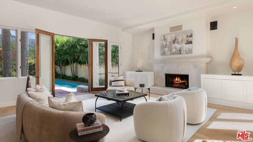 Tucked behind a private courtyard with tile floors and a - Beach Home for sale in Malibu, California on Beachhouse.com