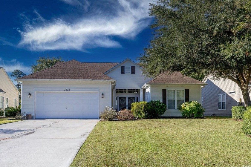 Offering the ease of one-level living, this beautifully - Beach Home for sale in Murrells Inlet, South Carolina on Beachhouse.com