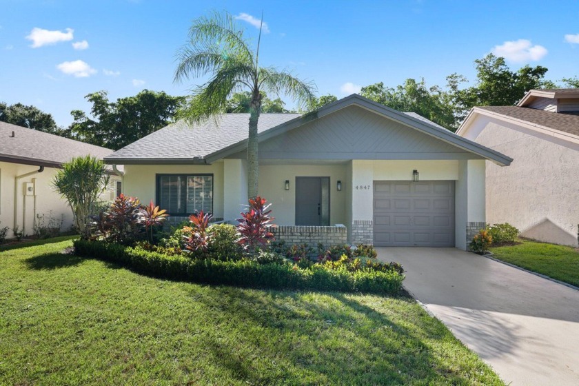 Introducing this immaculately freshly renovated home in the - Beach Home for sale in Boynton Beach, Florida on Beachhouse.com