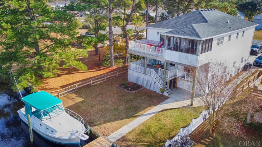 Enjoy fabulous water views from this spacious canal front home - Beach Home for sale in Kill Devil Hills, North Carolina on Beachhouse.com