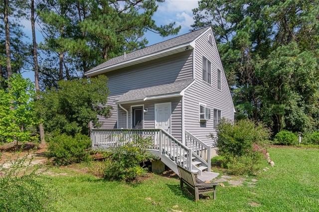 This beautifully maintained waterfront home is nestled on a - Beach Home for sale in Susan, Virginia on Beachhouse.com