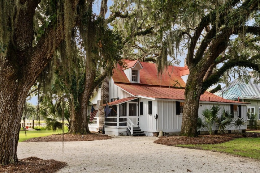 Tucked away in the heart of historic McClellanville, this rare - Beach Home for sale in Mcclellanville, South Carolina on Beachhouse.com