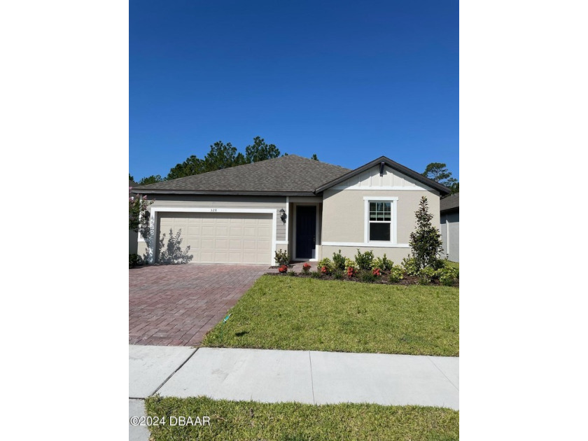 Experience the allure of this gorgeous BRAND NEW home this is - Beach Home for sale in Daytona Beach, Florida on Beachhouse.com