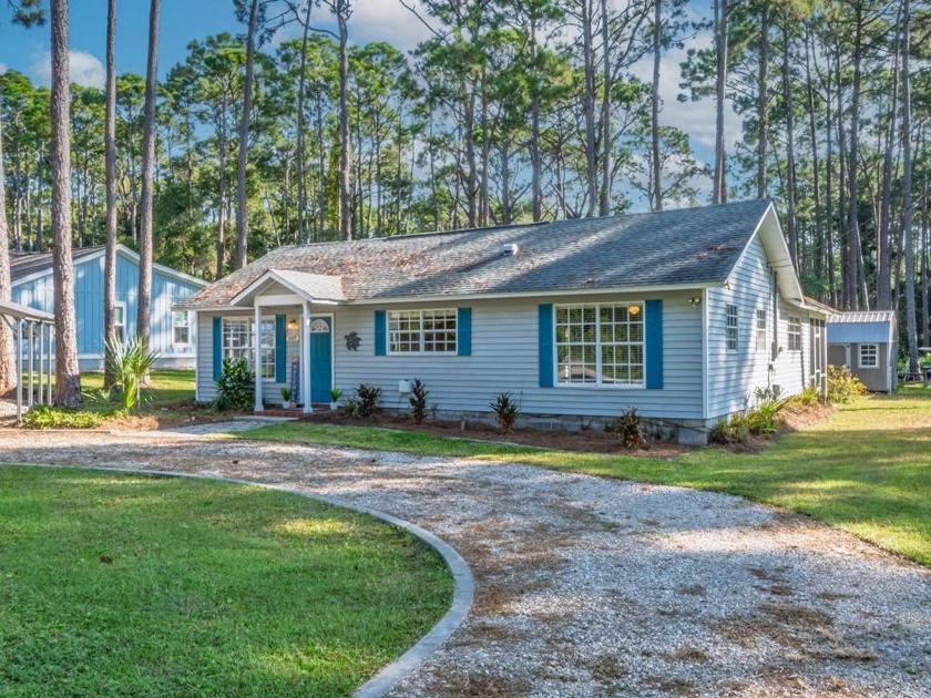 This 3-bedroom, 2-bath coastal home is a gem, on over half an - Beach Home for sale in Carabelle, Florida on Beachhouse.com