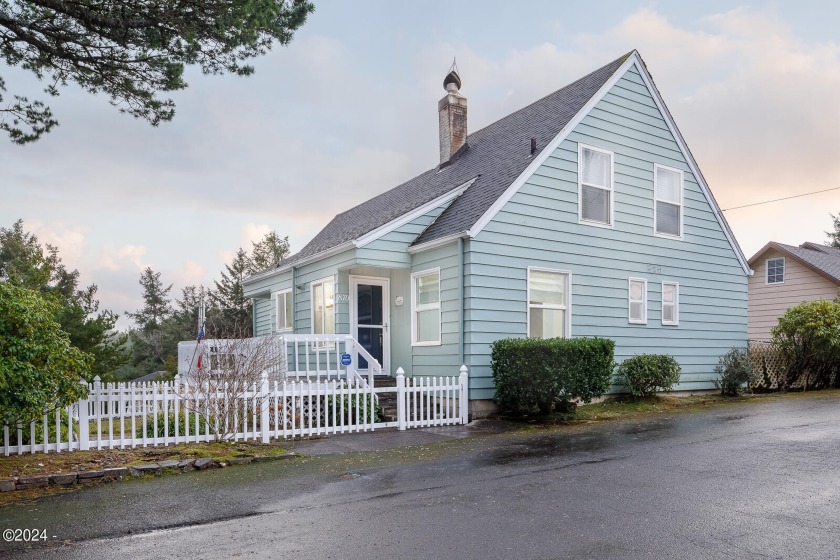 Tucked away in a quiet neighborhood, this beautiful Cape Cod - Beach Home for sale in Lincoln City, Oregon on Beachhouse.com