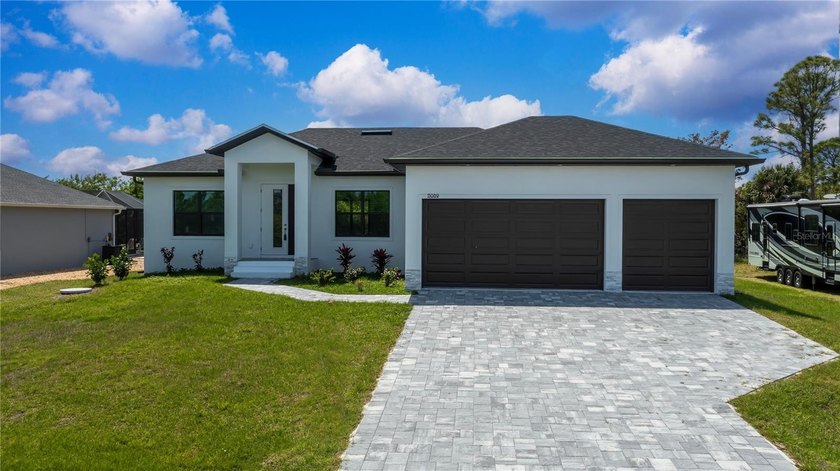 Experience true luxury living in this stunning 2025 custom - Beach Home for sale in Port Charlotte, Florida on Beachhouse.com
