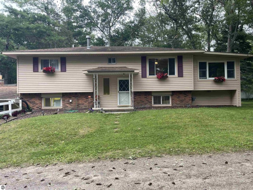 This spacious 4 bedroom, 3.5 bath offers plenty of room for your - Beach Home for sale in Au Gres, Michigan on Beachhouse.com