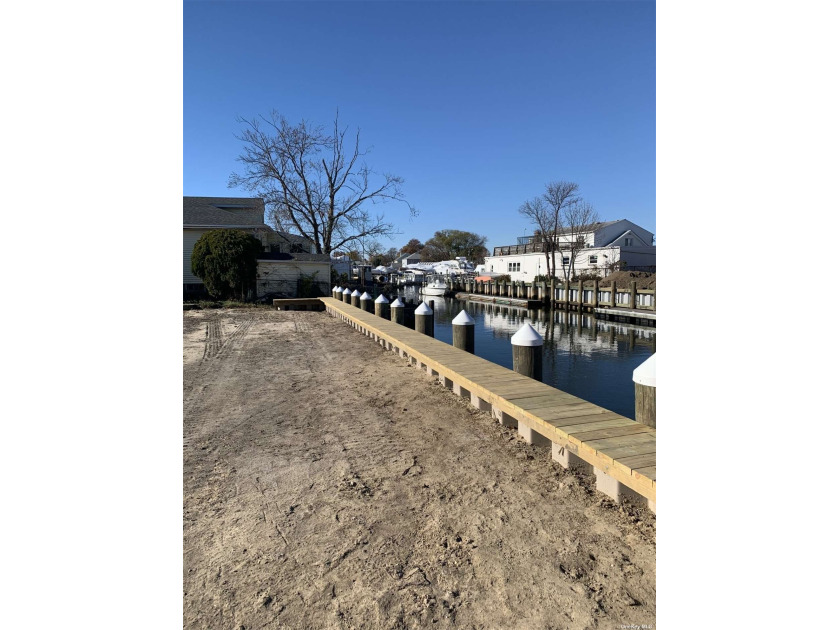Cleared, Level Lot with 64ft of Brand New Bulkhead. House can be - Beach Lot for sale in Freeport, New York on Beachhouse.com