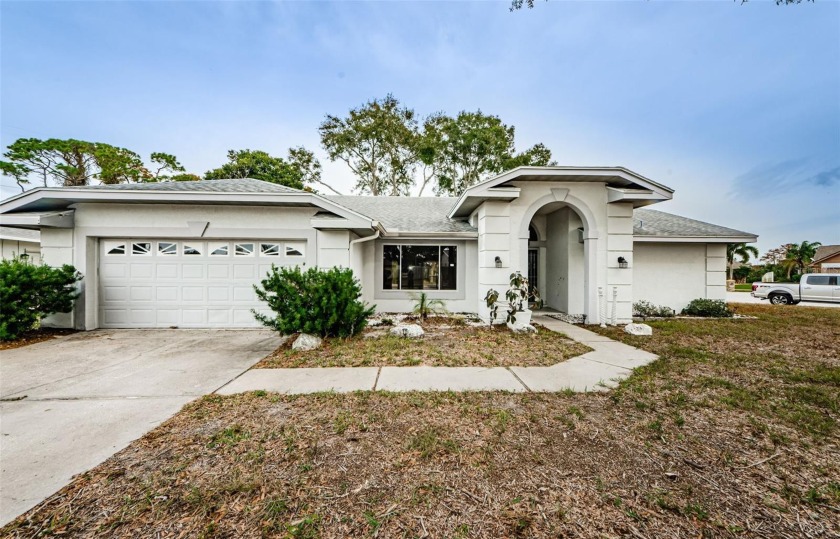 Welcome to this charming 3 bed, 2 bath home plus flex/office - Beach Home for sale in Holiday, Florida on Beachhouse.com
