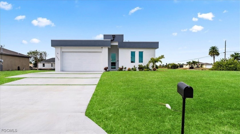 Say hello to this beautiful newly built home in Cape Coral, FL! - Beach Home for sale in Cape Coral, Florida on Beachhouse.com