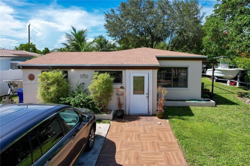 Located on a desirable corner lot in North Miami Beach, this - Beach Home for sale in North Miami Beach, Florida on Beachhouse.com
