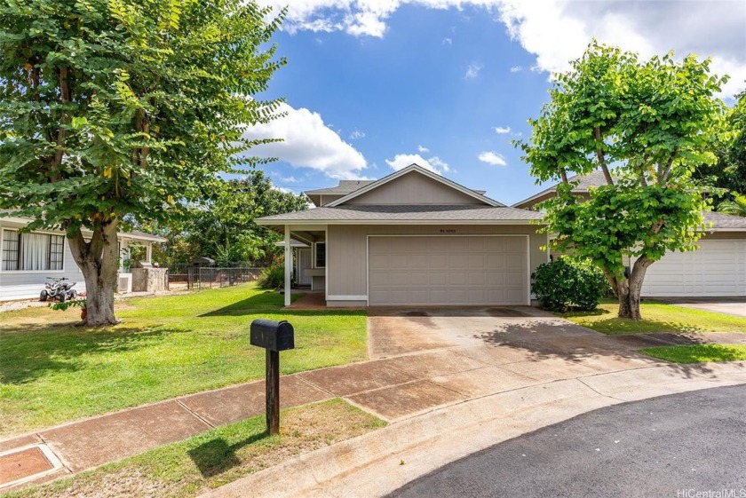 This beautifully upgraded 3-bedroom, 2-bathroom home is nestled - Beach Home for sale in Ewa Beach, Hawaii on Beachhouse.com