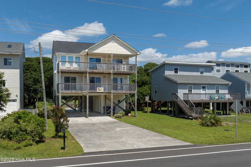 Experience the ultimate in coastal living at this beautifully - Beach Home for sale in Surf City, North Carolina on Beachhouse.com