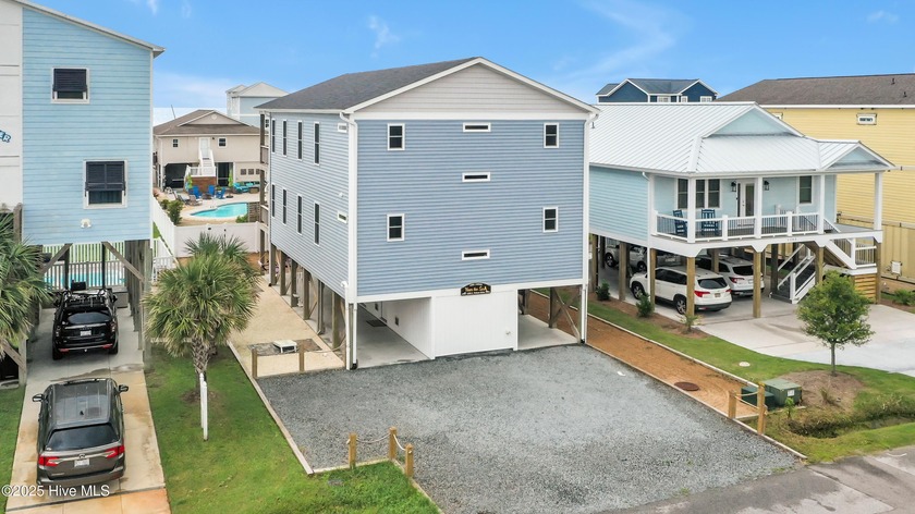 Enjoy coastal living at its finest in this beautiful two-story - Beach Home for sale in Oak Island, North Carolina on Beachhouse.com