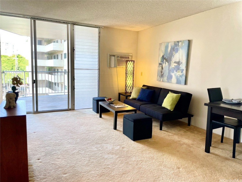 Priced $50,000 below assessed value, this spacious 2 Bedrooms - Beach Condo for sale in Honolulu, Hawaii on Beachhouse.com