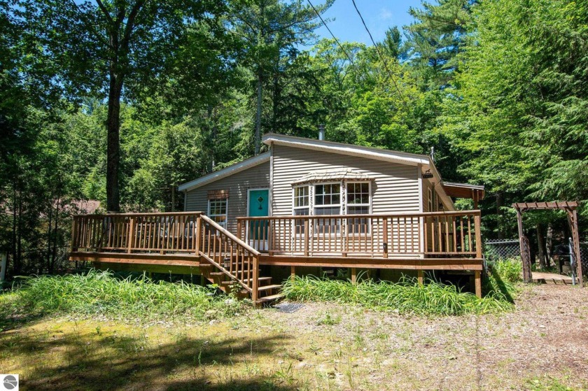 This well maintained 3 bedroom, 2 bath ranch home is nestled - Beach Home for sale in Northport, Michigan on Beachhouse.com