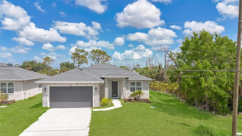 New construction completed in 2024, located in the Rotonda - Beach Home for sale in Rotonda West, Florida on Beachhouse.com