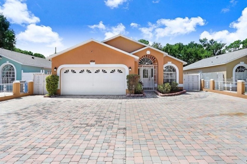 Welcome to this beautifully updated 4-bedroom, 3-bathroom - Beach Home for sale in Tampa, Florida on Beachhouse.com