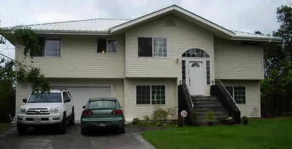 Step into island living with this beautiful 4-bedroom, 3-bath - Beach Home for sale in Keaau, Hawaii on Beachhouse.com