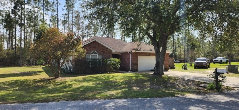 Discover the perfect blend of comfort, quality, and small-town - Beach Home for sale in Wewahitchka, Florida on Beachhouse.com