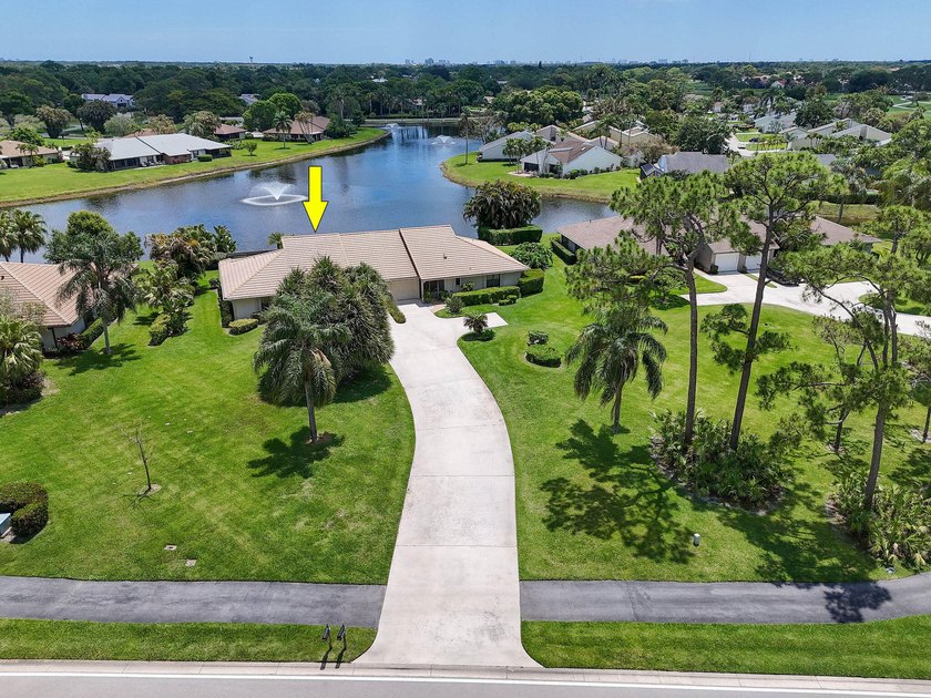 Tucked within the gates of Eastpointe Country Club, this well - Beach Home for sale in Palm Beach Gardens, Florida on Beachhouse.com