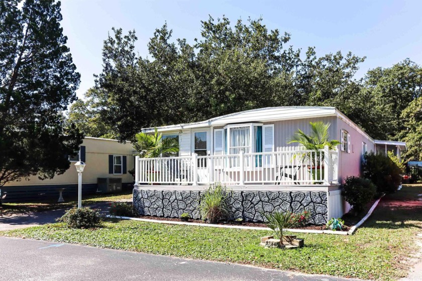 Welcome to 139 Ridgeway Loop, a charming 2-bedroom, 2-bathroom - Beach Home for sale in Murrells Inlet, South Carolina on Beachhouse.com