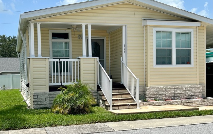 Don't miss this beautiful 2015 home in a 55+ Community. Newer - Beach Home for sale in Clearwater, Florida on Beachhouse.com