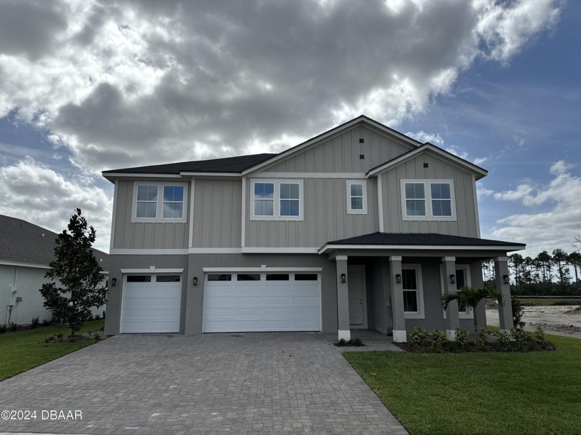 Two-story home, the Heron Elevation B model, located at Lot 130 - Beach Home for sale in Daytona Beach, Florida on Beachhouse.com