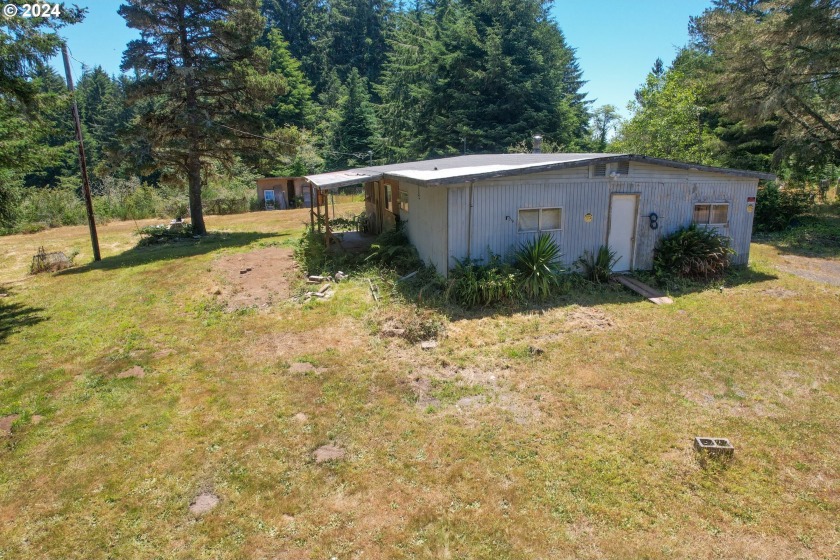 Located just outside of town, this expansive 7-acre property - Beach Home for sale in Coos Bay, Oregon on Beachhouse.com