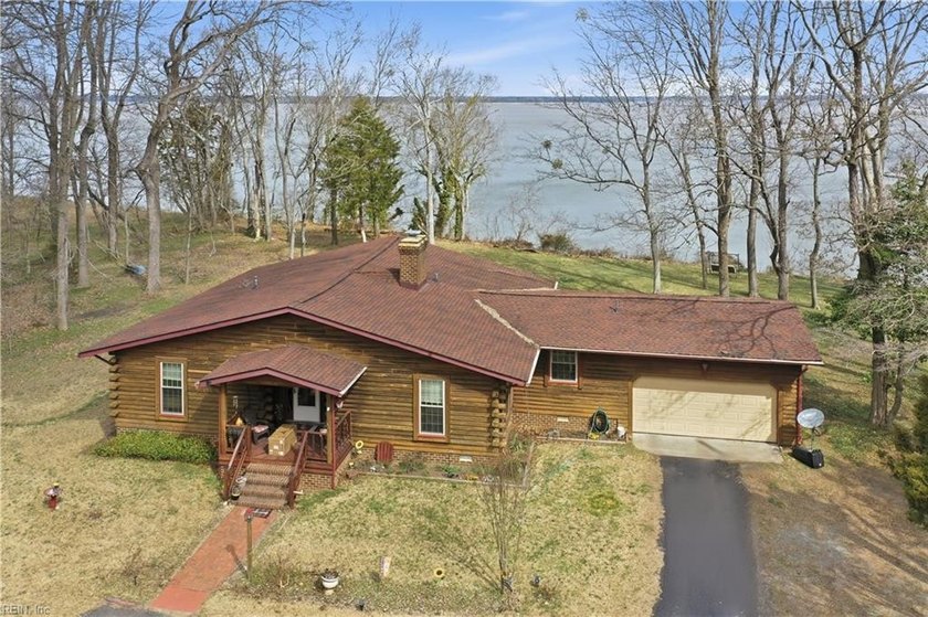 THIS LOG HOME IS LOCATED ON THE JAMES RIVER IN A QUIET - Beach Home for sale in Surry, Virginia on Beachhouse.com
