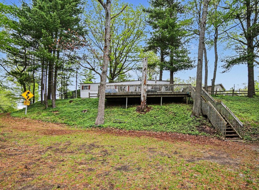 SILVER LAKE - Tucked into the heart of Silver Lake recreation - Beach Home for sale in Mears, Michigan on Beachhouse.com