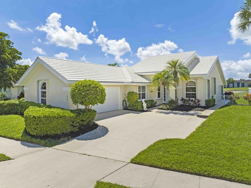 Immaculately maintained Divosta-built home, located in the gated - Beach Home for sale in West Palm Beach, Florida on Beachhouse.com