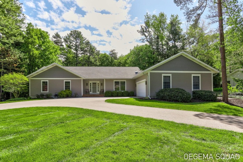 Welcome to your dream home, a move-in-ready gem offering main - Beach Home for sale in Grand Haven, Michigan on Beachhouse.com