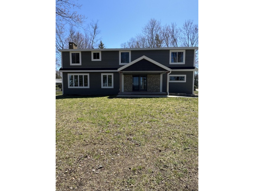 Experience waterfront luxury in this stunning newly remodeled - Beach Home for sale in Sault Sainte Marie, Michigan on Beachhouse.com