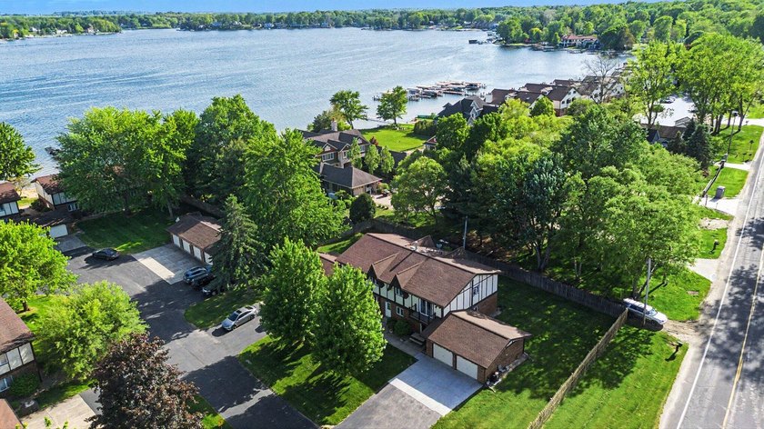 Experience effortless lake living at this beautiful 2-bedroom - Beach Condo for sale in Coloma, Michigan on Beachhouse.com