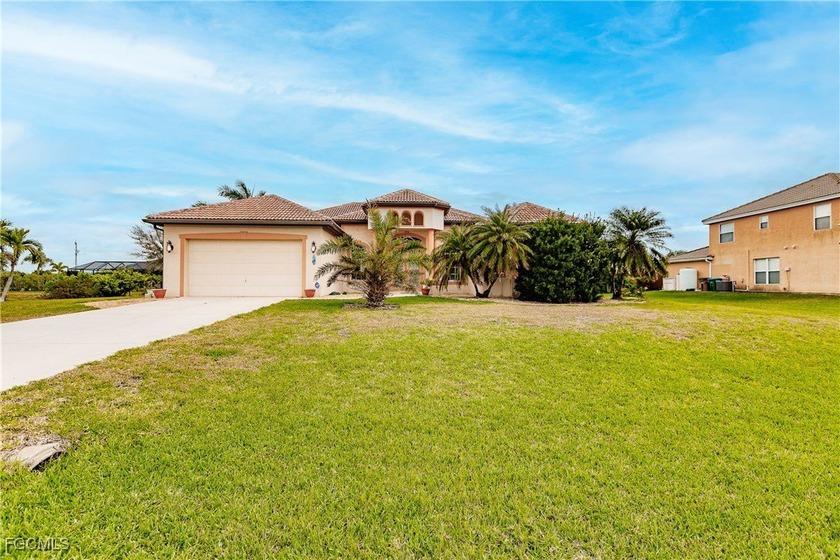 Spacious Cape Coral Retreat on a Triple Lot! Welcome to this - Beach Home for sale in Cape Coral, Florida on Beachhouse.com