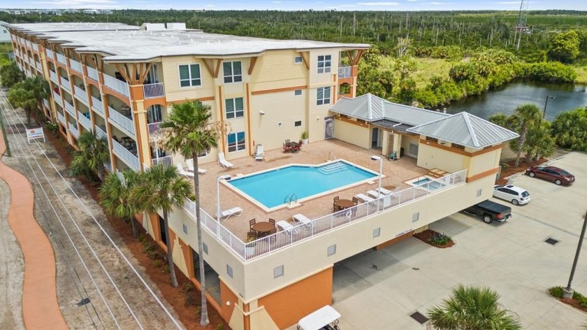 Experience coastal elegance in this furnished 2-bedroom, 2-bath - Beach Condo for sale in Mexico Beach, Florida on Beachhouse.com