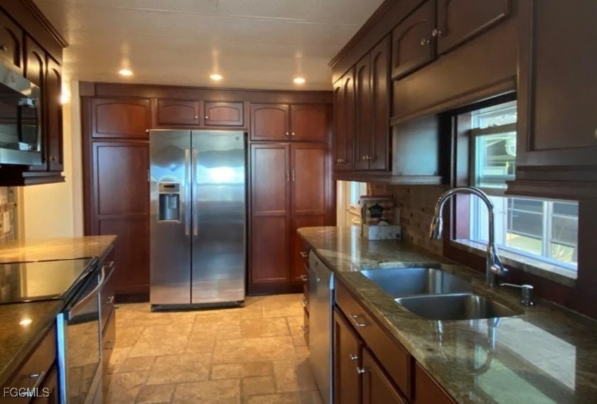 Discover your dream home in the resort-style waterfront boating - Beach Home for sale in North Fort Myers, Florida on Beachhouse.com