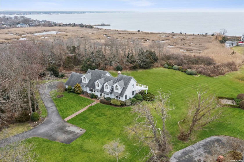 Welcome to a meticulously crafted residence, a testament to - Beach Home for sale in Blue Point, New York on Beachhouse.com
