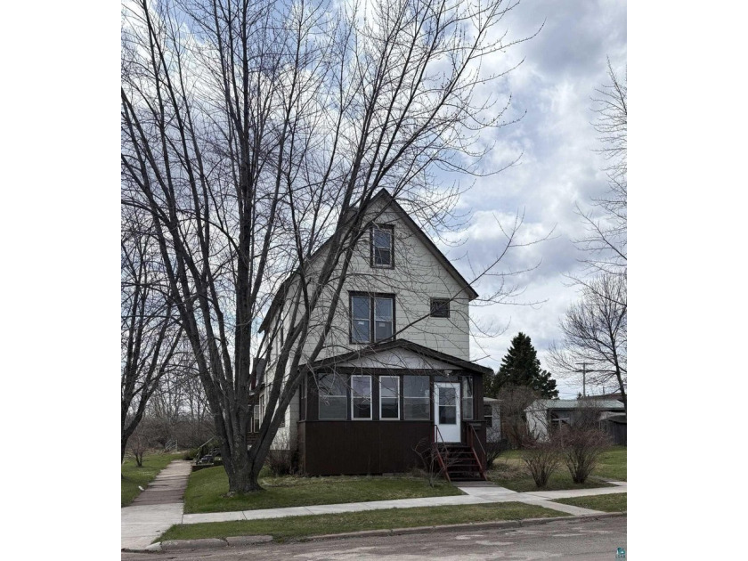 The old historic charm brought to life in this well cared for - Beach Home for sale in Two Harbors, Minnesota on Beachhouse.com