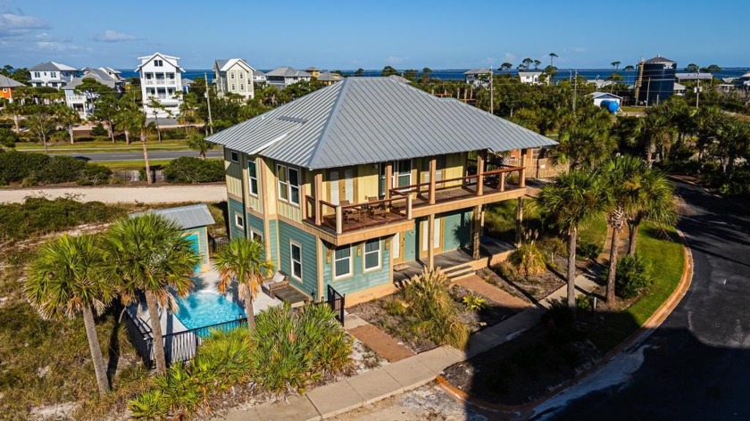 Nestled in the pristine gated community of Ovation, this - Beach Home for sale in Cape San Blas, Florida on Beachhouse.com