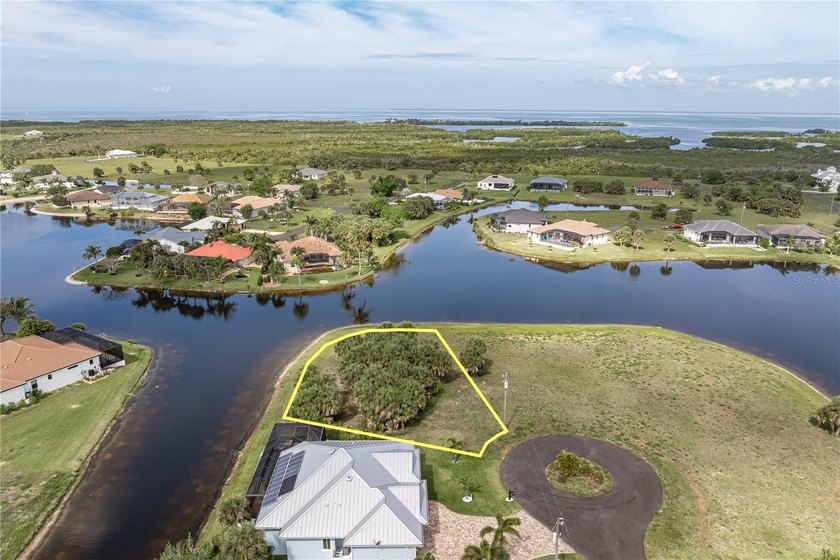 LAKE VIEWS & COLORFUL SUNSETS! Oversized, lakefront, tip lot in - Beach Lot for sale in Punta Gorda, Florida on Beachhouse.com