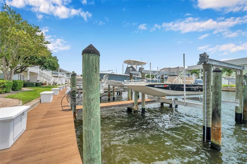 Seize this incredible opportunity to own both a deeded boat slip - Beach Lot for sale in St. Petersburg, Florida on Beachhouse.com