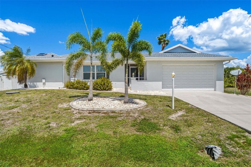 DOUBLE LOT!! SOUTH GULF COVE 2 BEDROOM, 2 BATH, 2-CAR GARAGE - Beach Home for sale in Port Charlotte, Florida on Beachhouse.com