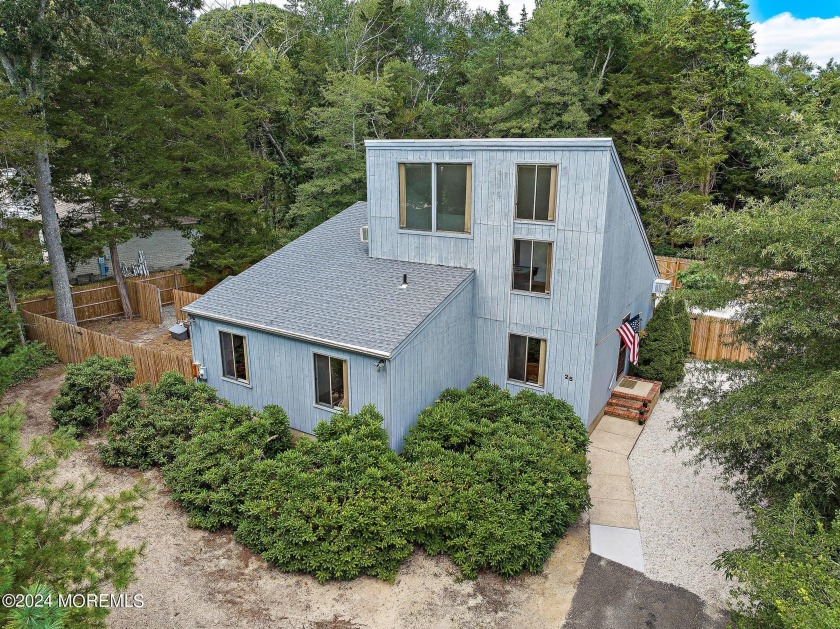 Discover a rare opportunity to own a distinctive 1  1/2  story - Beach Home for sale in Little Egg Harbor, New Jersey on Beachhouse.com