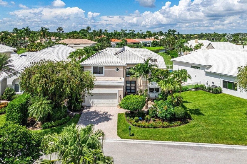 Soaring two-story ceiling heights greet you upon entering this - Beach Home for sale in Boca Raton, Florida on Beachhouse.com