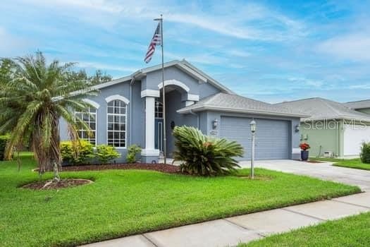 This immaculate home shows wonderfully and sits on one of the - Beach Home for sale in New Port Richey, Florida on Beachhouse.com